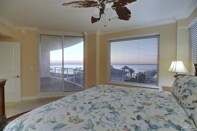 bedroom featuring carpet flooring, ceiling fan, ornamental molding, and access to outside