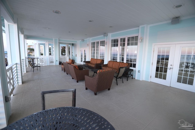 interior space with an outdoor hangout area and french doors