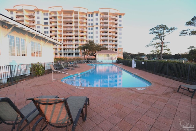 view of pool featuring a patio area