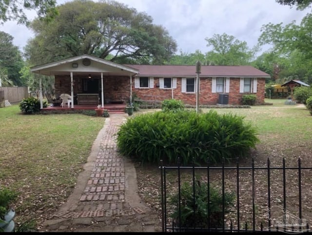 6232 Jalyn Rd, Pensacola, FL 32503 - single story home with a front yard, covered porch, brick siding, and fence