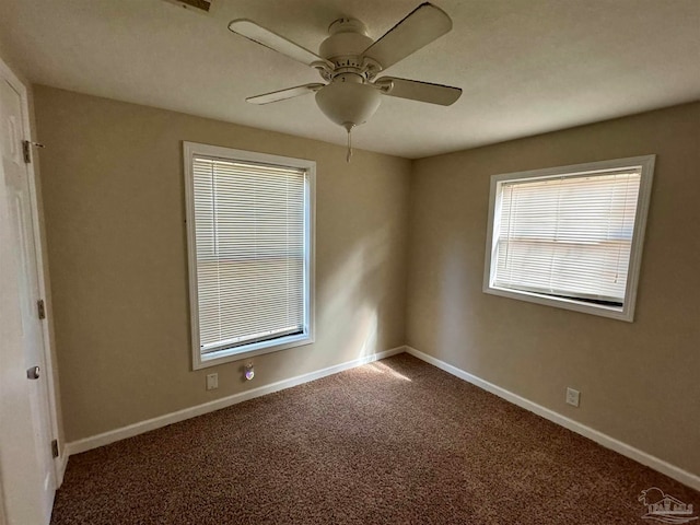 carpeted empty room with ceiling fan