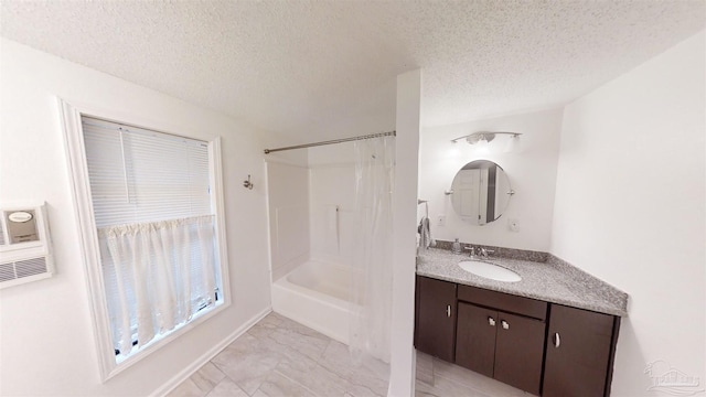 bathroom featuring vanity, a textured ceiling, and tub / shower combination