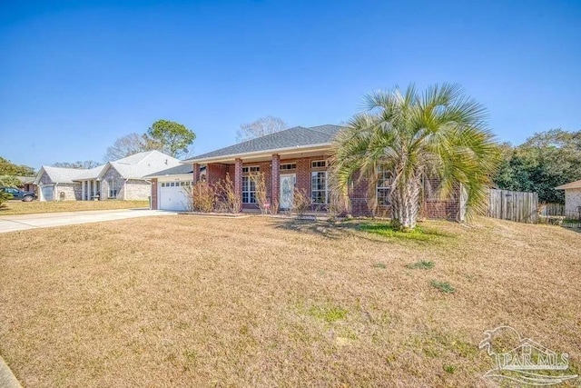 ranch-style home with a front yard and a garage