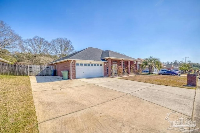 single story home with a garage and a front lawn