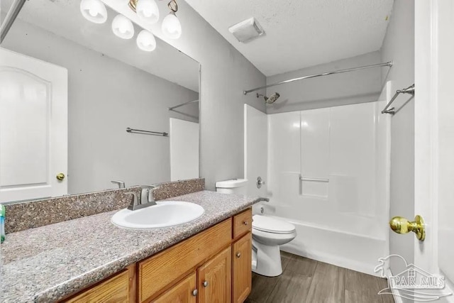 7210 Annandale Dr, Pensacola, FL 32526 - full bathroom featuring shower / bathing tub combination, hardwood / wood-style floors, vanity, and toilet