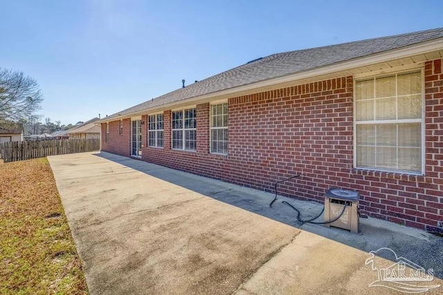 7210 Annandale Dr, Pensacola, FL 32526 - view of side of home with a patio area