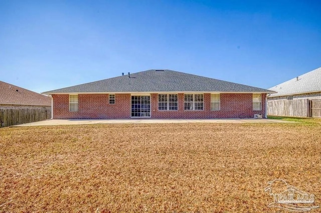 7210 Annandale Dr, Pensacola, FL 32526 - back of house featuring a yard and a patio