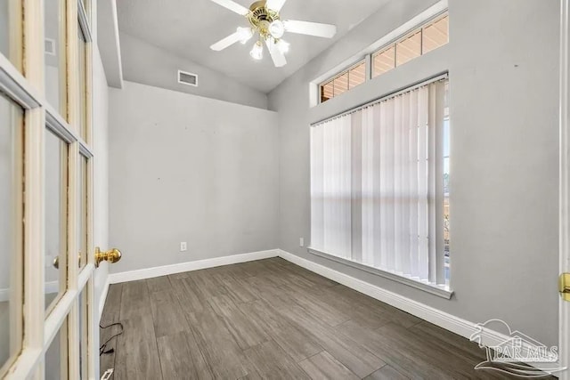 7210 Annandale Dr, Pensacola, FL 32526 - spare room featuring ceiling fan, wood-type flooring, and lofted ceiling