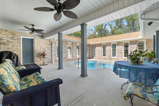 view of patio featuring ceiling fan