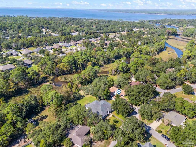 drone / aerial view with a water view