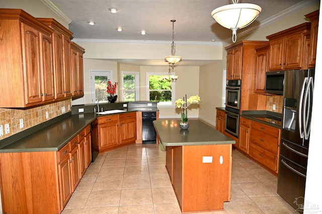 kitchen featuring stainless steel appliances, sink, a kitchen island, decorative backsplash, and light tile patterned flooring