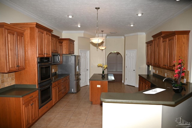 kitchen featuring light tile patterned flooring, backsplash, a kitchen island, sink, and ornamental molding