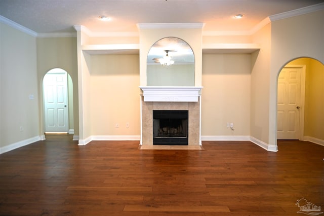 unfurnished living room with a fireplace, wood-type flooring, and ornamental molding