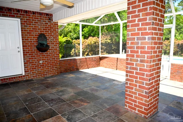 view of patio / terrace with glass enclosure