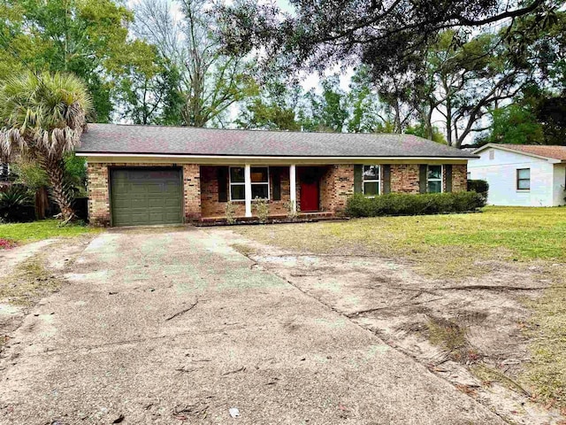 ranch-style house with a garage and a front lawn