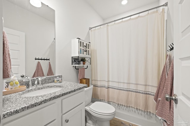 5534 Blake Ln, Pace, FL 32571 - bathroom with toilet, vanity, and wood finished floors