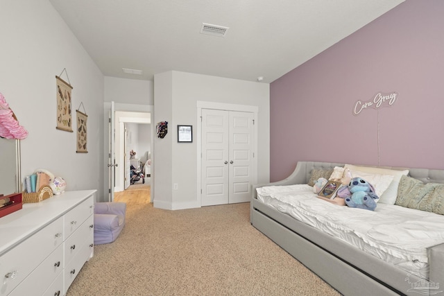 5534 Blake Ln, Pace, FL 32571 - bedroom featuring light carpet, a closet, and baseboards