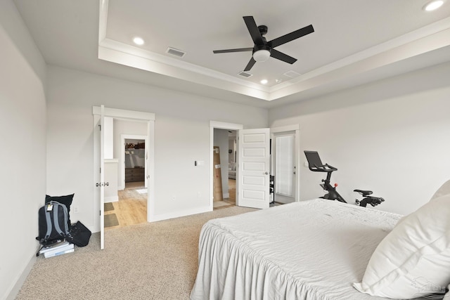 5534 Blake Ln, Pace, FL 32571 - bedroom with light colored carpet, baseboards, recessed lighting, a tray ceiling, and ornamental molding