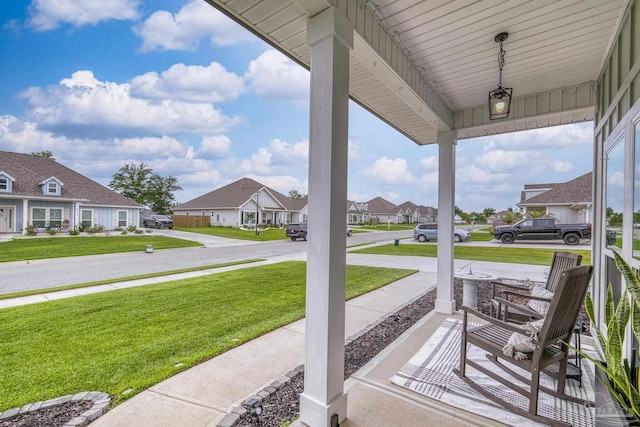 5534 Blake Ln, Pace, FL 32571 - view of patio with a porch and a residential view