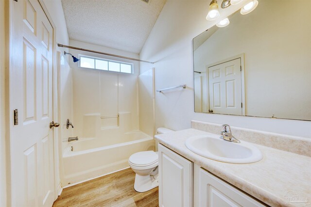 7101 Joy St Unit D5, Pensacola, FL 32504 - full bath featuring toilet, wood finished floors, vanity,  shower combination, and a textured ceiling