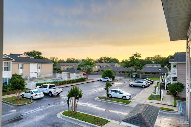 7101 Joy St Unit D5, Pensacola, FL 32504 - view of asphalt road featuring curbs, a residential view, and sidewalks