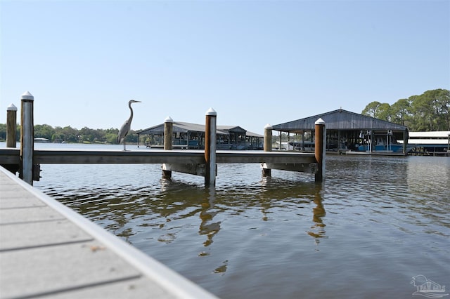 view of dock with a water view
