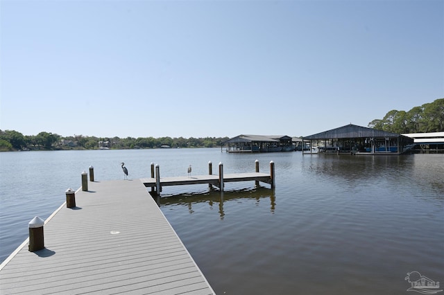 view of dock with a water view