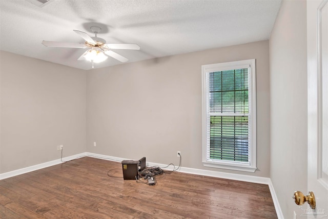 unfurnished room featuring ceiling fan, a textured ceiling, and hardwood / wood-style flooring