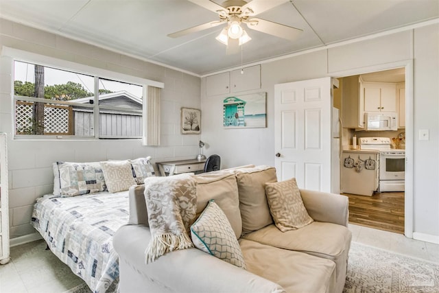214 Payne Rd, Pensacola, FL 32507 - bedroom featuring light tile patterned floors, a ceiling fan, crown molding, and freestanding refrigerator