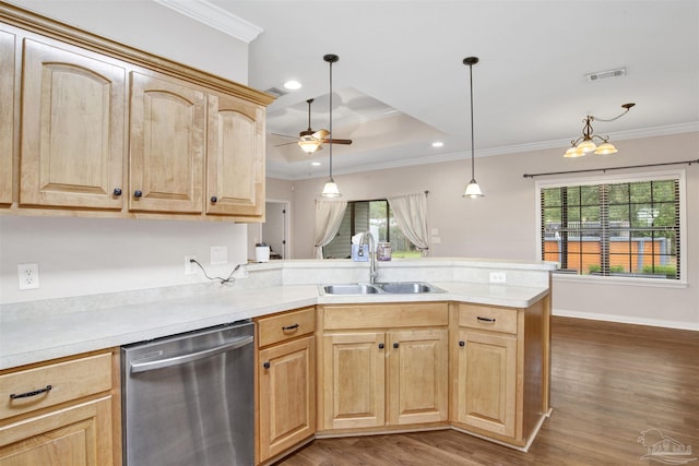 kitchen with crown molding, sink, stainless steel dishwasher, and light brown cabinets