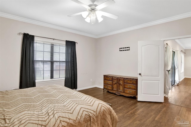 bedroom with crown molding, dark hardwood / wood-style floors, and ceiling fan