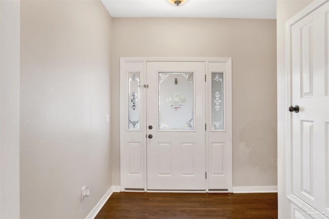 entrance foyer featuring dark hardwood / wood-style flooring