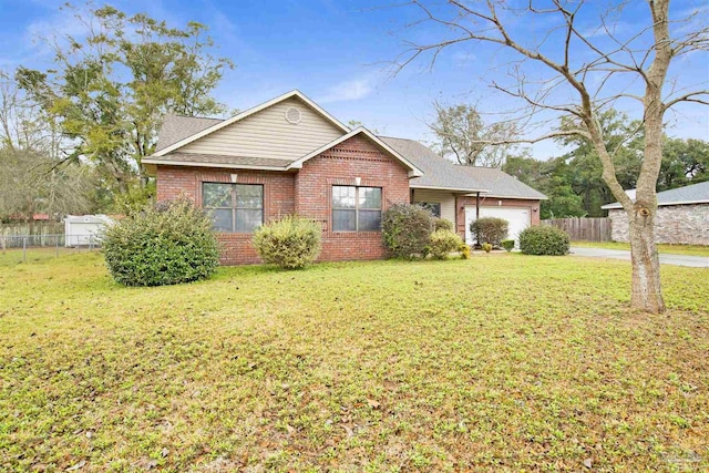 view of front facade featuring a garage and a front yard