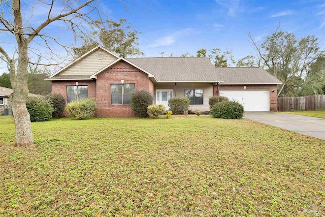 single story home with a garage and a front lawn