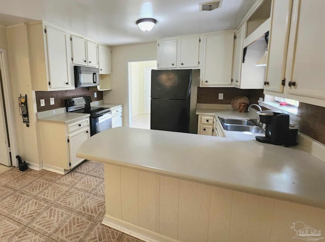 kitchen with black appliances, tasteful backsplash, white cabinetry, sink, and kitchen peninsula