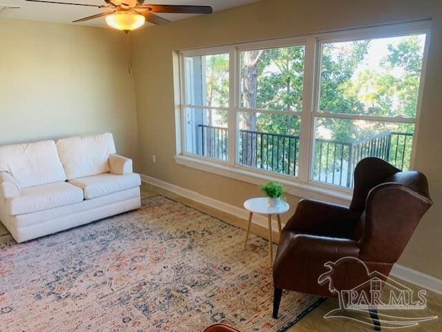 living room with ceiling fan