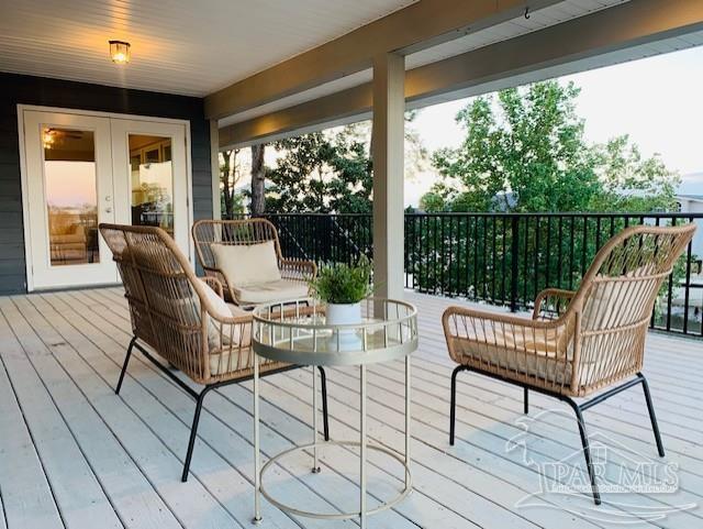 sunroom / solarium with french doors