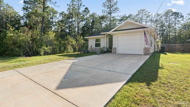 ranch-style home featuring a garage