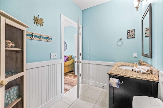 bathroom with vanity and tile patterned floors