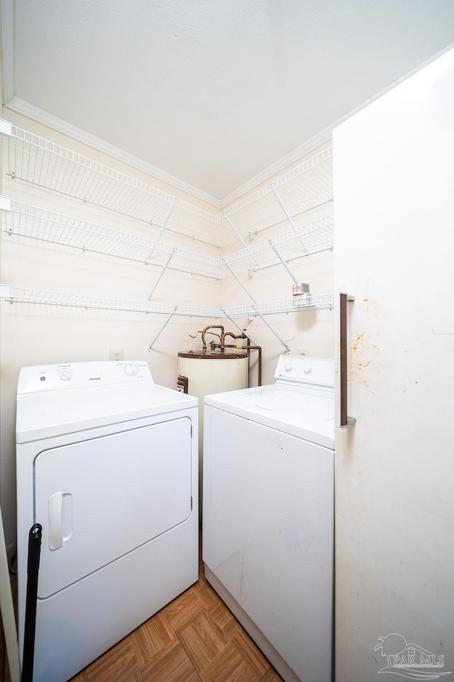 laundry room featuring independent washer and dryer and light parquet floors