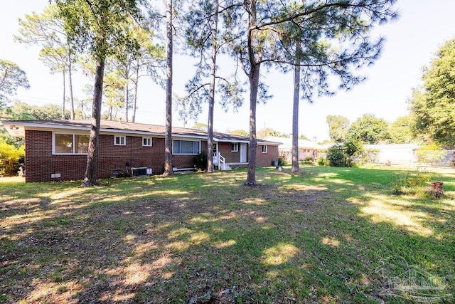 view of yard featuring central AC