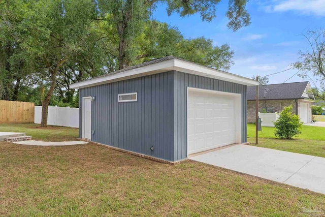 garage with a yard