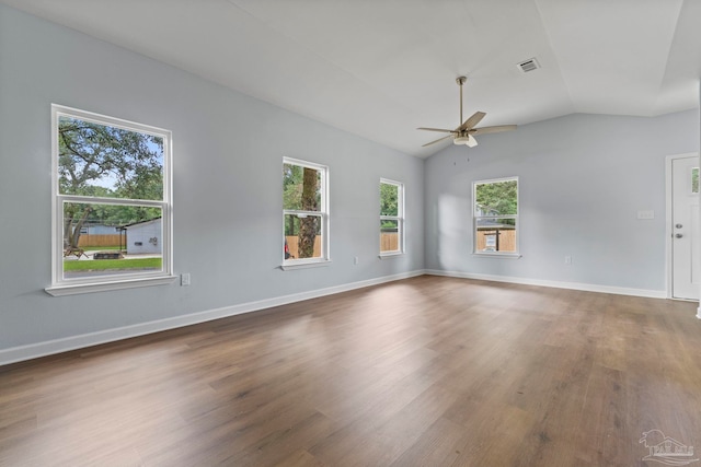 unfurnished room featuring ceiling fan, lofted ceiling, and hardwood / wood-style flooring