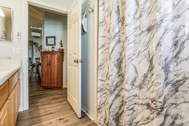 hallway featuring light hardwood / wood-style flooring