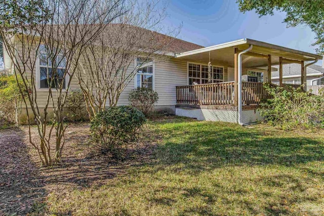 exterior space with a lawn and covered porch