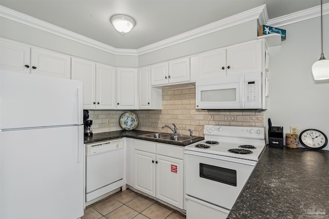 kitchen featuring sink, white cabinets, decorative backsplash, hanging light fixtures, and white appliances