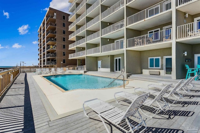 view of swimming pool featuring a patio