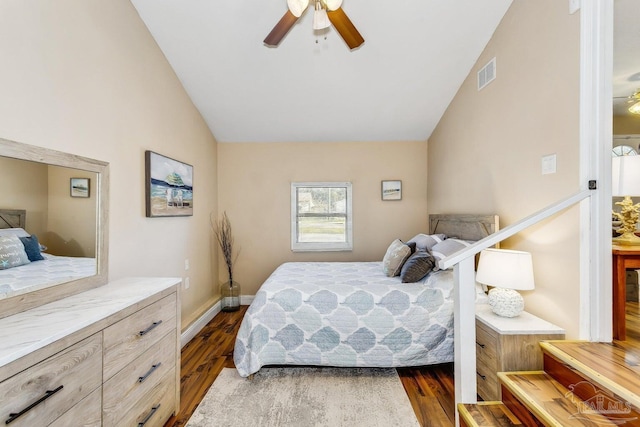 bedroom featuring dark wood-type flooring, ceiling fan, and lofted ceiling