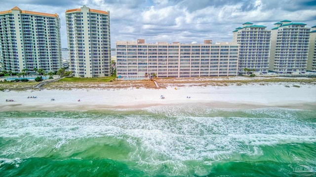 bird's eye view with a view of the beach and a water view