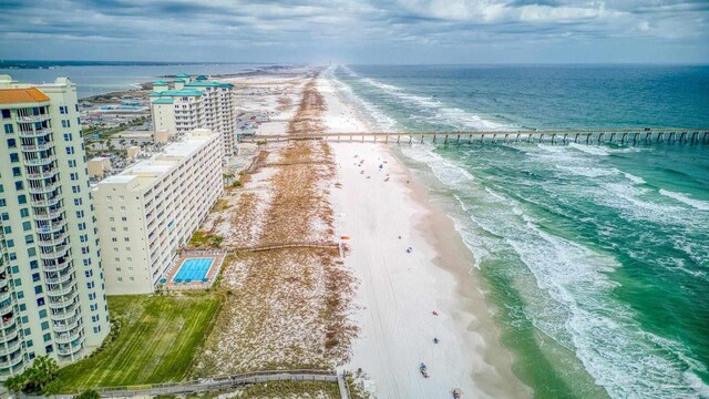 aerial view with a beach view and a water view